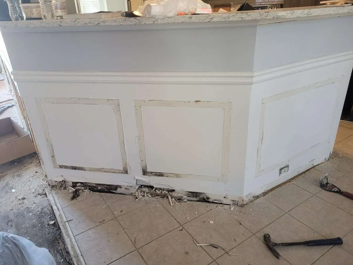 Water damage and mold on kitchen during Storm Damage Restoration in Lockport